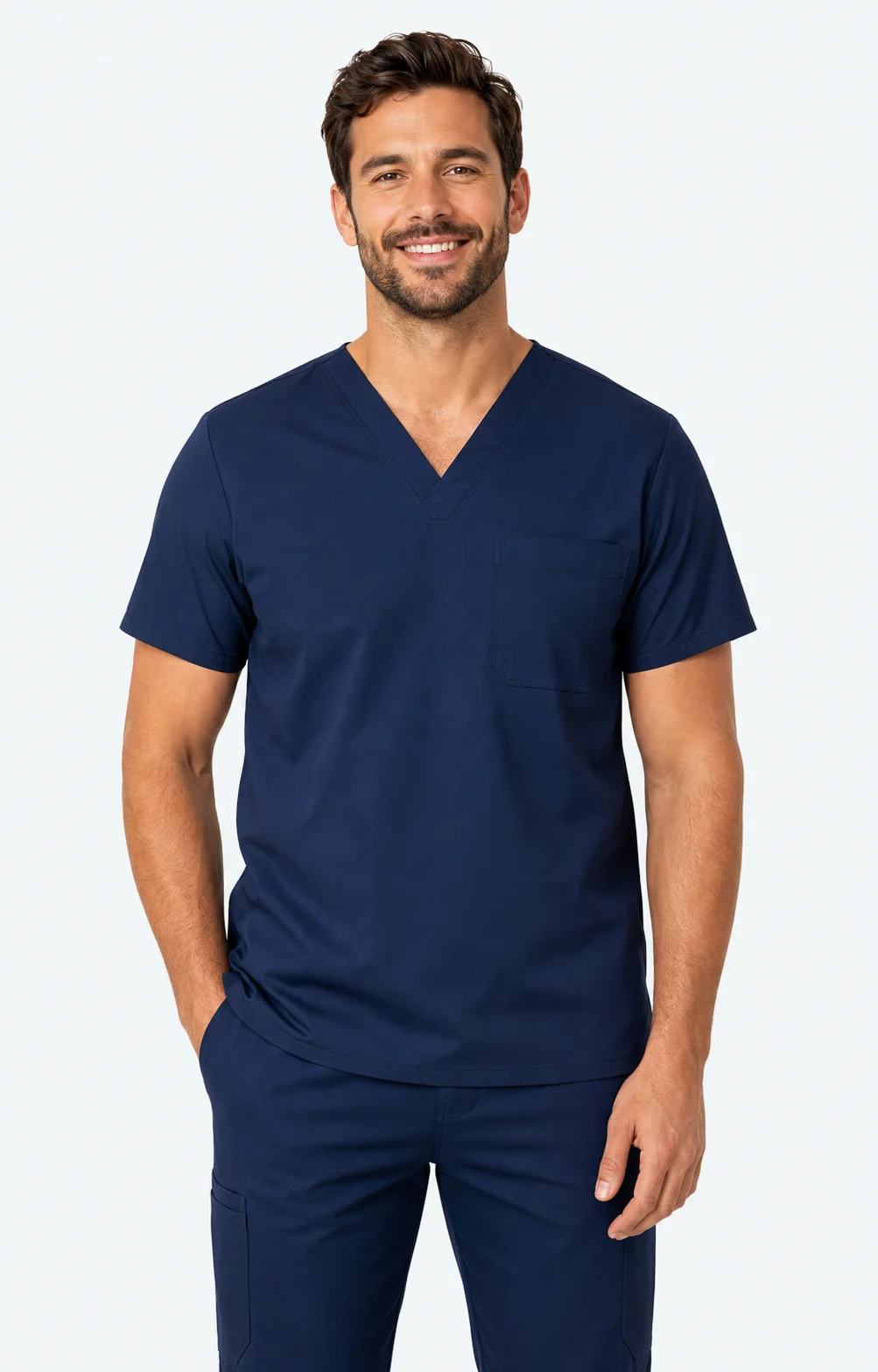 Male healthcare professional wearing navy blue medical scrubs